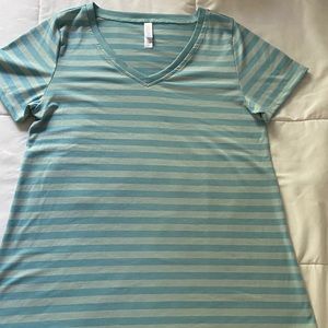 Shirt/blouse. Never worn.